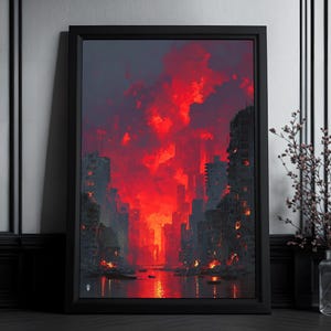 Op de afbeelding: Een ingelijste verticale wandkunstprint met een stadsgezicht dat wordt opgeslokt door felrode vlammen en donkere rook. De compositie toont silhouetten van gebouwen langs een centraal pad met een gloeiende rode lucht en reflecties op de grond.