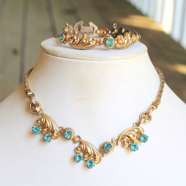 Stunning Vintage Light Gold Tone Metal and Blue Rhinestone Matching Necklace and Bracelet signed Barclay