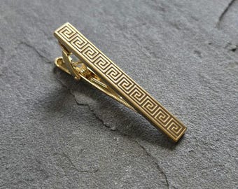 Griekse meander goudkleurige dasclip