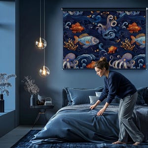 May include: A set of three ceramic nesting bowls in shades of blue, green, and white. The bowls feature a speckled glaze and a simple, modern design. The largest bowl is approximately 7 inches in diameter.