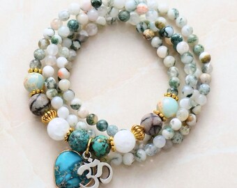 Groene edelsteen ketting met Om bedeltje. Turkooizen hart van natuursteen. Valentijnscadeau voor haar.