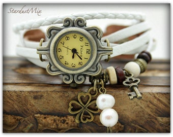 Vraie montre-bracelet millésimée de cuir avec des Perles d'eau douce