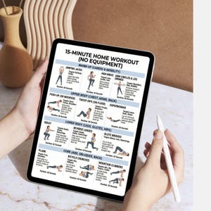 May include: A tablet displays a 15-minute home workout routine with no equipment needed. The workout includes exercises like jumping jacks, high knees, arm circles, leg swings, push-ups, tricep dips, squats, reverse lunges, glute bridges, planks, bicycle crunches, and mountain climbers.