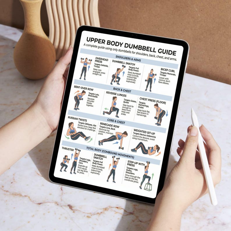 May include: A tablet displays an "Upper Body Dumbbell Guide" with exercise illustrations for shoulders, back, chest, and arms. The guide includes exercises like Overhead Press, Dumbbell Snatch, and Bicep Curl. A stylus is held near the screen.