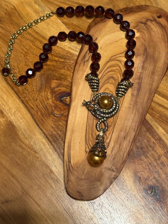 Gold Snake Design Pendant Faux Gold Pearls And Ruby Red Beads Attached To A Matching Necklace ,    Designed By Heidi Daus.  HUGH SAVINGS