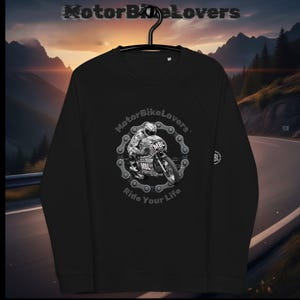 May include: Black sweatshirt with a motorcycle graphic. The design features a motorcycle racer inside a chain, with the text "MotorBikeLovers" and "Ride Your Life". The sweatshirt has long sleeves and a crew neck.