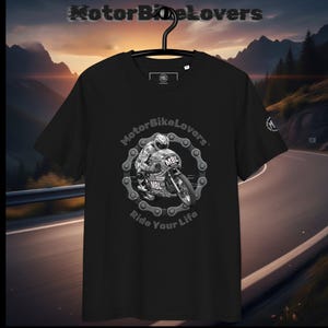 May include: Black t-shirt with a motorcycle graphic inside a chain design. The text "MotorBikeLovers" is at the top, and "Ride Your Life" is at the bottom. The shirt is hanging on a black hanger.