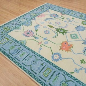 Hand Knotted Wool Oushak Rug 9x12: Cream, Blue, Green, and Pink