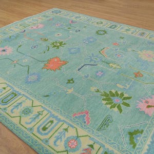 Hand Knotted Wool Oushak Rug: Mint Green Floral Turkish Carpet