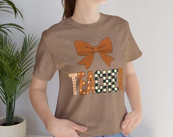 Maglietta autunnale per insegnanti, grafica con fiocco, abbigliamento per educatori per il ritorno a scuola