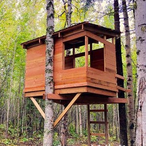 May include: A set of three ceramic mugs with a speckled, matte finish. The mugs are in shades of cream, light gray, and dark gray. Each mug has a simple, minimalist design and a rounded handle.