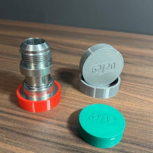 May include: A rustic wooden sign with the text "Welcome to our home" in white lettering. The sign has a distressed finish and a simple, inviting design, ideal for entryway decor.