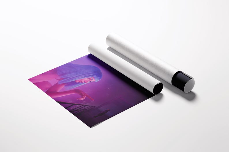 May include: A rolled art print featuring a woman with blue hair in a purple and pink setting, next to two white cylindrical tubes with black end caps. The print is partially unrolled, revealing the artwork.