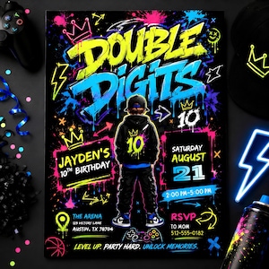 May include: A black birthday invitation flyer featuring neon graffiti art with the text DOUBLE DIGITS 10, JAYDEN'S 10TH BIRTHDAY, SATURDAY AUGUST 21, 2:00 PM-5:00 PM, THE ARENA 123 VICTORY LANE AUSTIN, TX 78704, RSVP TO MOM 512-555-0182, LEVEL UP. PARTY HARD. UNLOCK MEMORIES.