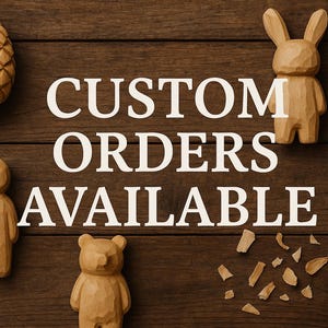 May include: A white ceramic mug with a black handle and the text "But First, Coffee" in a bold, black font. The mug is set against a neutral background, highlighting its simple design.