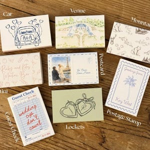 May include: A collection of decorative cards with various designs. Includes a car with hearts, a venue illustration, a mountain scene, a martini bar, a guest check with text, a postcard, a pair of lockets, and a postage stamp.