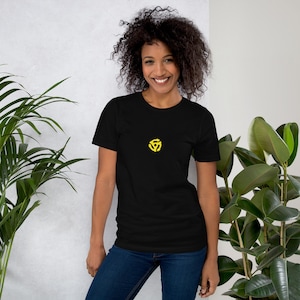 May include: A black short-sleeved t-shirt with a yellow vinyl record symbol on the front.