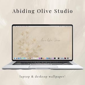 May include: A silver laptop showing a beige floral wallpaper with the words "love like Jesus." The image also includes the text "Abiding Olive Studio" and "laptop & desktop wallpaper!"