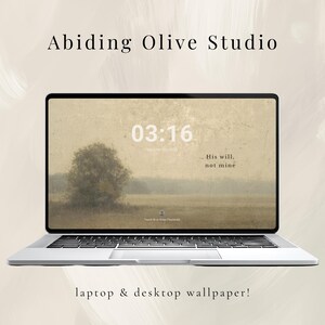 May include: A silver laptop displaying a desktop wallpaper with a landscape scene and the text "03:16" and "... His will, not mine." The words "Abiding Olive Studio" and "laptop & desktop wallpaper!" are also visible.