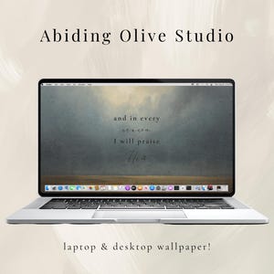 May include: A silver laptop showing a desktop wallpaper with a landscape painting and the text "and in every season I will praise". The image also includes the text "Abiding Olive Studio" and "laptop & desktop wallpaper!"