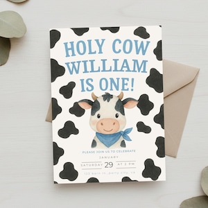 May include: A rectangular invitation card with a cow theme. The card features a cartoon cow illustration, black cow spots, and the text "HOLY COW WILLIAM IS ONE!" in blue. Additional text includes the date and time of the event.