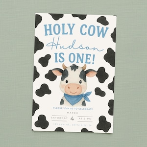 May include: A birthday invitation featuring a cartoon cow. The text "HOLY COW Hudson IS ONE!" is in blue. The invitation has a cow spot pattern. The date and time of the party are also included. The invitation is for a first birthday.