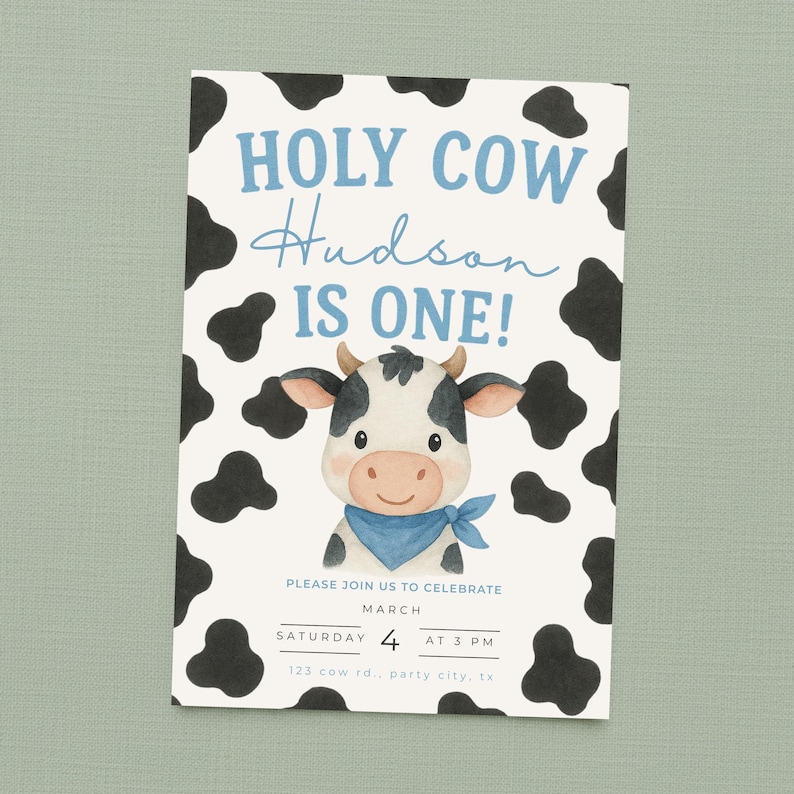 May include: A birthday invitation featuring a cartoon cow. The text "HOLY COW Hudson IS ONE!" is in blue. The invitation has a cow spot pattern. The date and time of the party are also included. The invitation is for a first birthday.