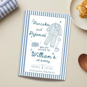 May include: A blue and white striped invitation card with the text "Pancakes and Pajamas" and "William's 4th birthday". The card features illustrations of pajamas, pancakes, and a coffee cup. The date is April 4th at 1 pm.