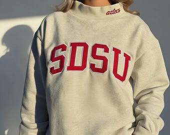 Sudadera de cuello alto personalizada • Polar de algodón orgánico, letras bordadas