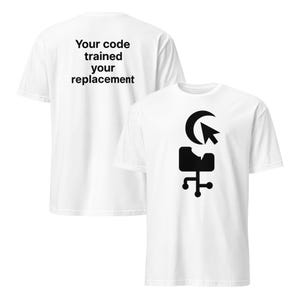 May include: White t-shirt with a black graphic of a computer chair, a crescent moon, and a cursor. The back of the shirt has the text "Your code trained your replacement" in black. The shirt is made of a soft, comfortable material.