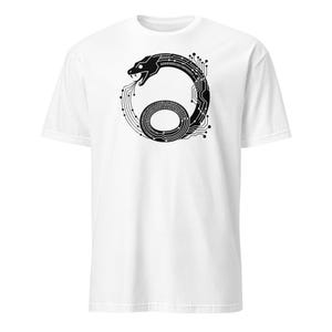 May include: White t-shirt featuring a black graphic of a snake in a circular design. The snake is stylized with circuit board patterns and binary code, creating a tech-inspired aesthetic. The shirt is made of a soft material.