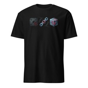 May include: Black t-shirt featuring a graphic design with three elements: a circuit board, a chain, and a box. The design incorporates red and blue accents, creating a tech-inspired aesthetic. The shirt is made of a soft material.