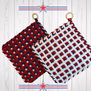 May include: Two woven potholders in red, white, and blue, with wooden ring handles. The potholders have a square shape and a woven pattern. The design evokes a patriotic theme.