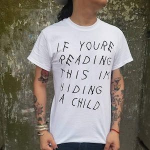 If You're Reading This I'm Hiding A Child t-shirt