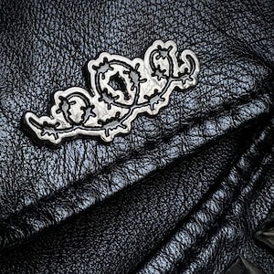 Barbed wire enamel pin
