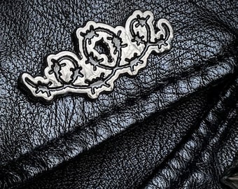 Barbed wire enamel pin