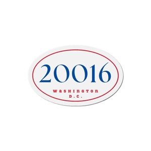 May include: Oval sticker with a white background, a red border, and the number "20016" in blue. Below the number, the text "WASHINGTON D.C." is printed in red.