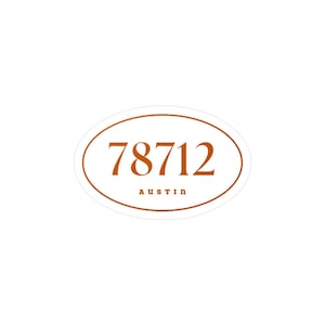 May include: Oval sticker with the text "78712" in a brown serif font, with "Austin" below in a smaller font. The sticker has a brown border and is set against a white background.