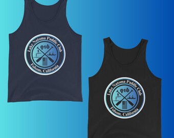 May include: Two tank tops, one navy blue and one black, each featuring a circular logo. The logo reads "Lake Natoma Paddle Club" with "916" and "Folsom, California" in a gradient blue and white design.
