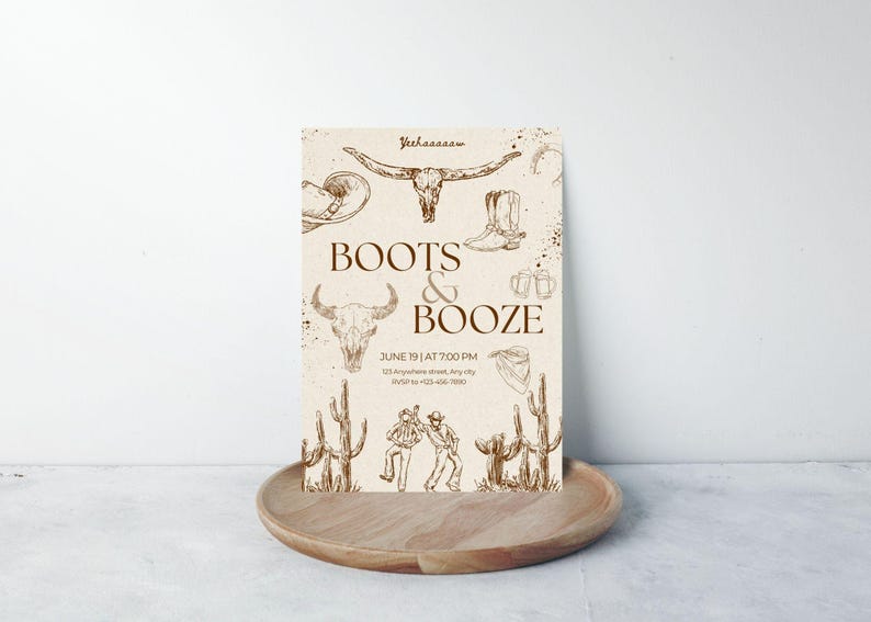 May include: A rustic invitation with the text "Boots & Booze" and cowboy-themed illustrations. The design includes images of a longhorn skull, cowboy boots, and cacti. The invitation is on a wooden tray.