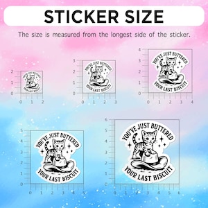 May include: A collection of black and white stickers with a cat illustration and the text "YOU'VE JUST BUTTERED YOUR LAST BISCUIT." The stickers vary in size, with measurements in inches displayed on a ruler.