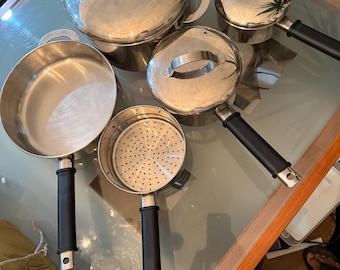 Copco stainless steel cookware pieces. 8 pieces