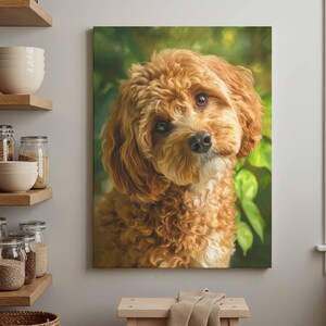May include: A rectangular wall art print featuring a portrait of a curly-haired golden-brown dog with large dark eyes and a black nose. The dog is positioned against a soft-focus background of green foliage, capturing a detailed canine expression.
