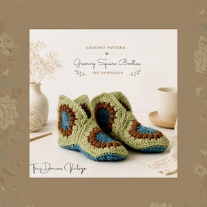 May include: A crochet pattern PDF download titled Granny Square Booties by Tini Dancer Vintage. The image displays a pair of handmade booties constructed from sage green, brown, and blue yarn in a classic granny square motif with a high-top design.