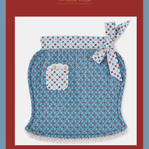 May include: A blue apron featuring a repeating pattern of small red and light blue flowers, a white pocket with a matching floral print, a white floral-patterned waistband with a side tie, and a white scalloped lace trim along the bottom edge.
