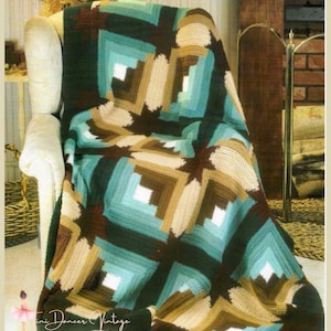 May include: A crochet blanket featuring a geometric log cabin pattern in shades of dark green, light teal, tan, and white. The textile displays a repeating square motif with concentric rectangular layers arranged in a structured, multi-colored design.