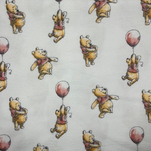 Tessuto in flanella di Winnie the Pooh, 100% cotone.
