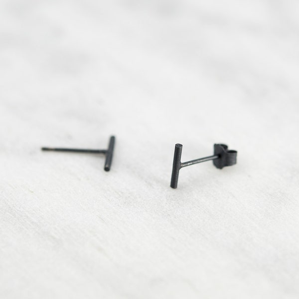 Tiny line stud earrings in silver