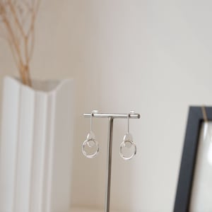 Silver urban earrings, dot circle linked image 1