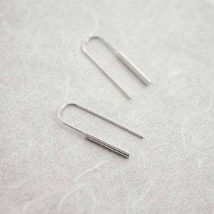 Long silver minimal earrings Shiny polished